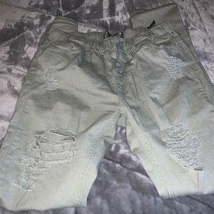 Khaki green ripped pants